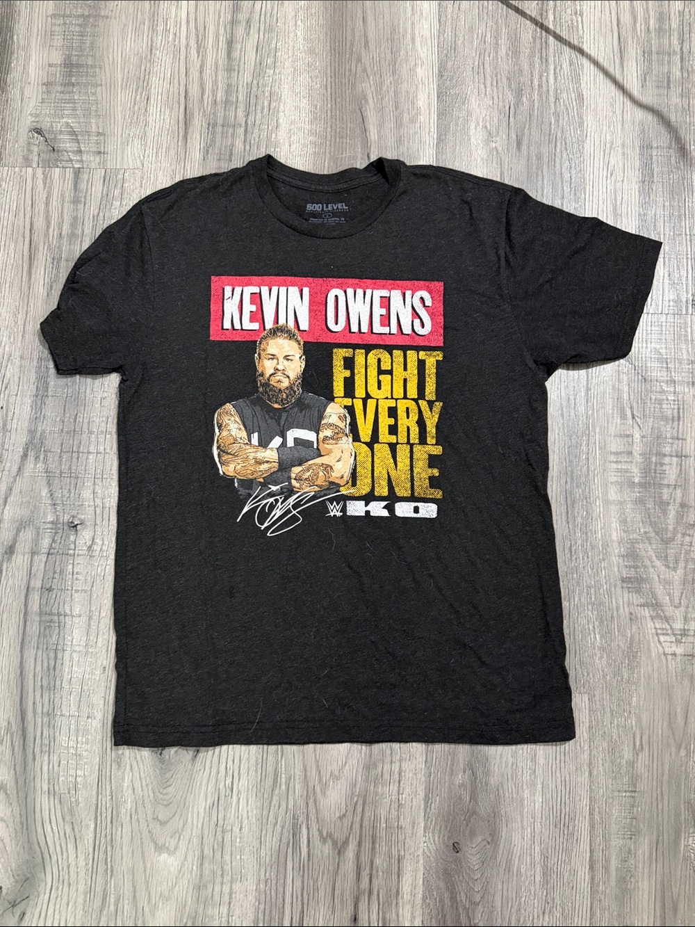 WWE Kevin Owens Black Tee with Red and Yellow Graphic